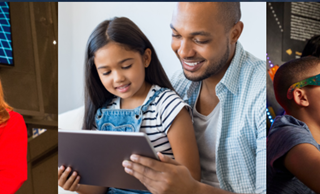 Adult woman wearing red coat demonstrating a spring. Dad with young daughter reading a book. Female teacher with two white elementary aged kids wearing 3D glasses.