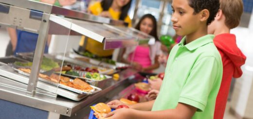 children receiving lunch in a cafeteria