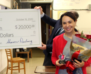 300x300 Leila Kubesch receiving a check for $20,000 after winning the Toyota Family Teacher of the Year Award