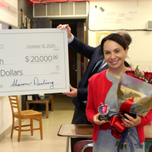 300x300 Leila Kubesch receiving a check for $20,000 after winning the Toyota Family Teacher of the Year Award